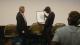 Mykaell (right) receiving his award certificate from the RSL from founder Norton York (left)